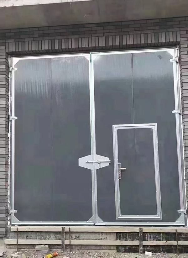 新城街道工业平开门在大型设备制造车间的应用实例